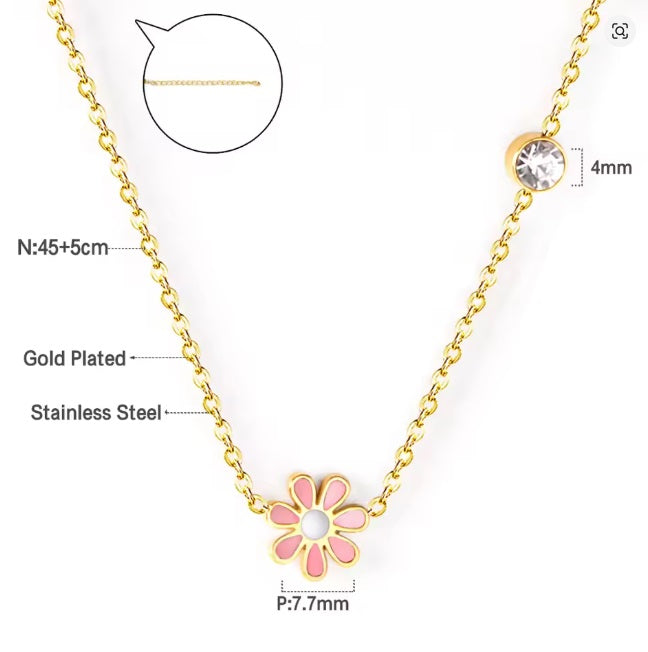 Daisy necklace featuring pink enamel flower pendant with clear CZ, crafted from gold plated stainless steel, 45cm + extension.