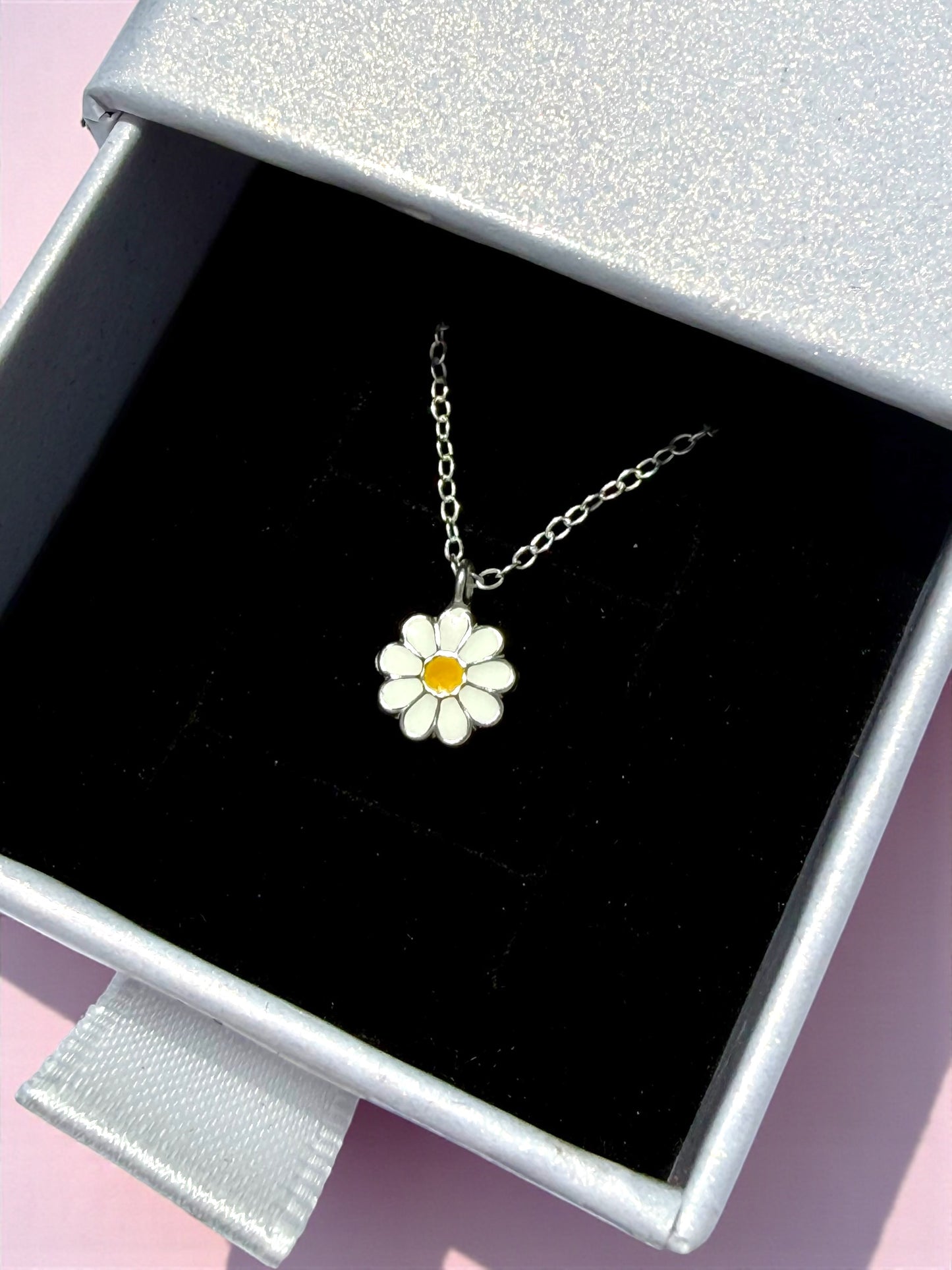 Children's necklace featuring a daisy pendant in 925 sterling silver with white and yellow enamel, beautifully packaged.