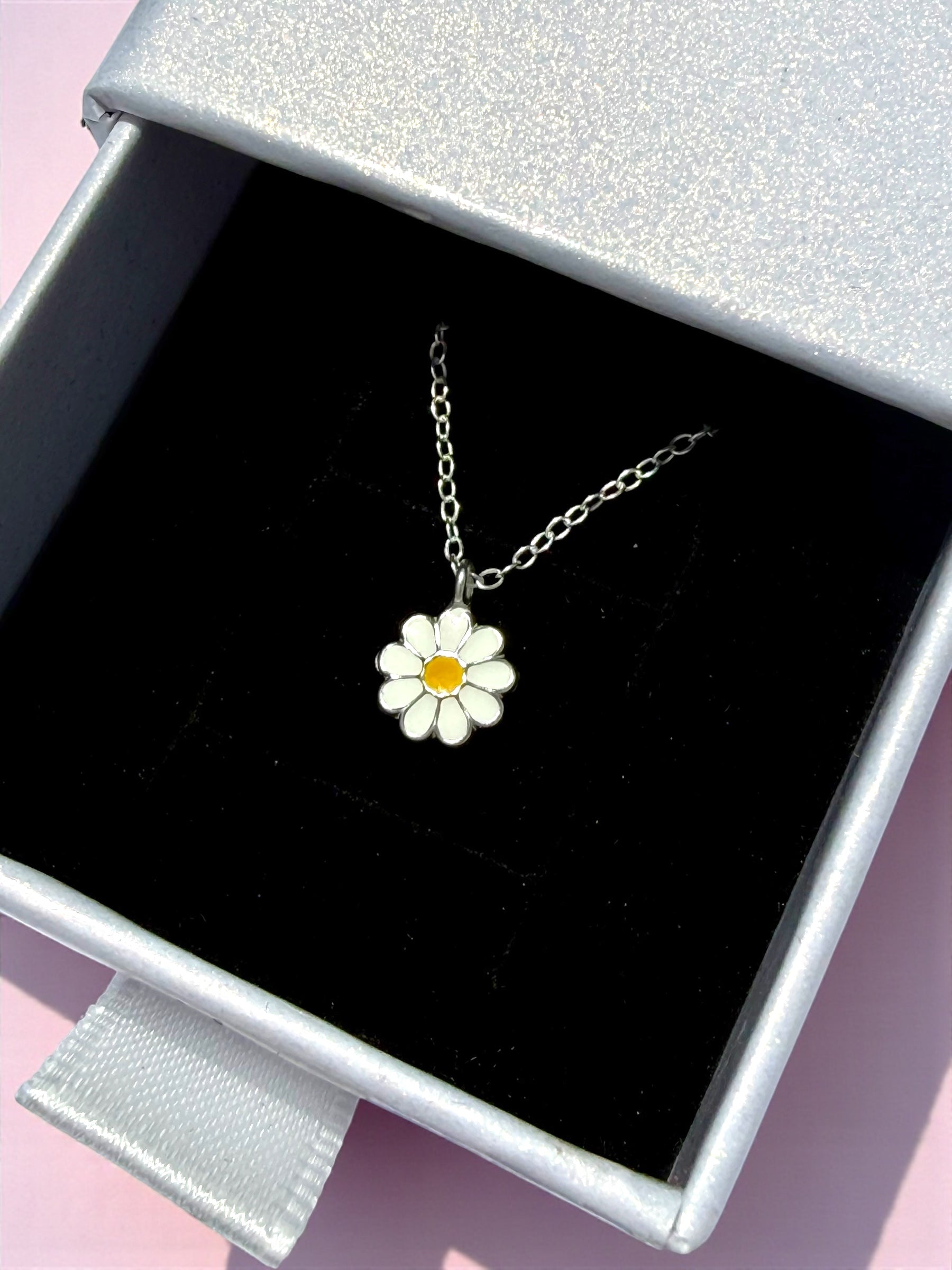 Children's necklace featuring a daisy pendant in 925 sterling silver with white and yellow enamel, beautifully packaged.