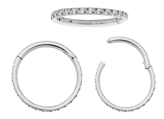 Children's earrings featuring G23 titanium paved CZ halo sleepers hinged hoop earrings in a stylish design.