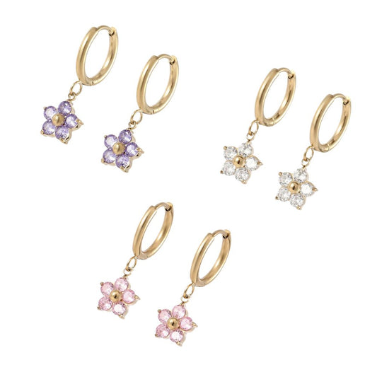 Flower hoop earrings featuring colorful flower charms in purple, pink, and clear cubic zirconia on gold hoops.
