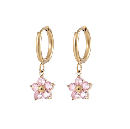 Flower hoop earrings featuring charming pink flower charms with gold plating and hoop design.