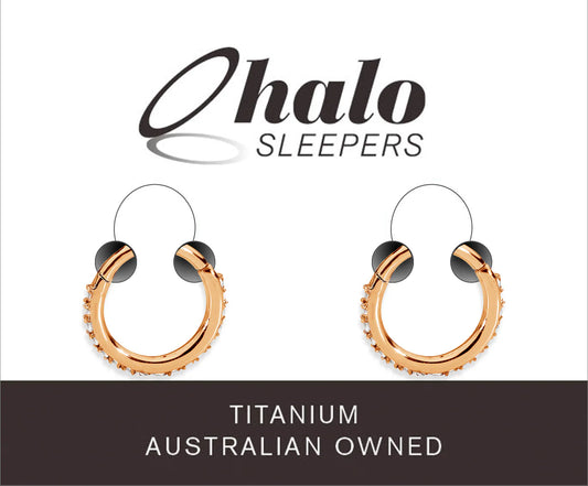 Children's earrings in 22CT rose gold plated G23 titanium with paved CZ halo design by Halo Sleepers.