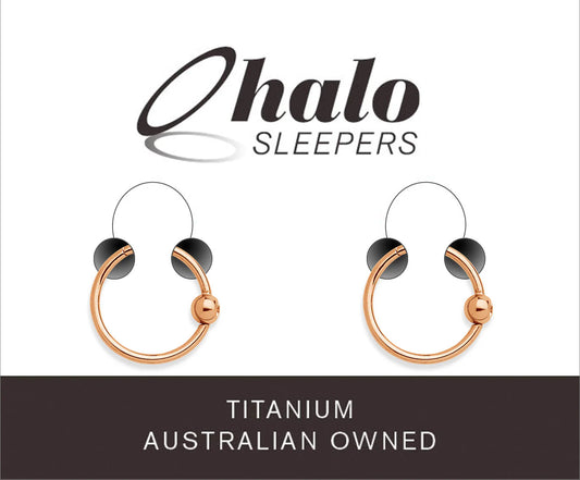 Children's earrings featuring rose gold anodized G23 titanium hinged hoop design by Halo Sleepers.