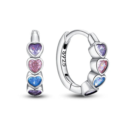 Heart hoop earrings made of 925 sterling silver featuring pink, purple, and blue CZ hearts, perfect for everyday wear.