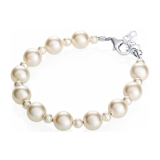 Pearl bracelet with silver clasp on a white background