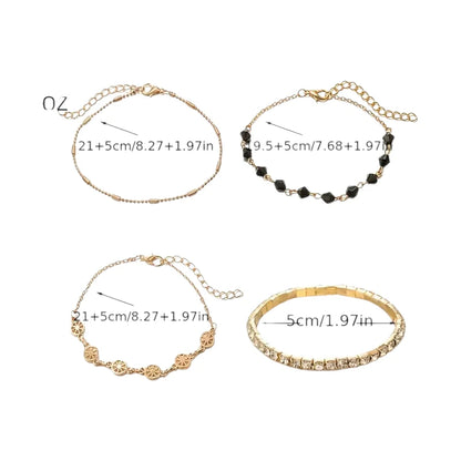 Layered bracelet set featuring three bracelets with black crystal accents, ideal for stylish layering and versatile wear.