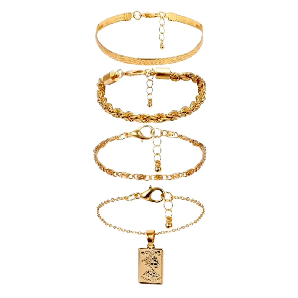 Layered bracelet set with three golden-tone bracelets for a stylish layered look.