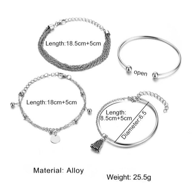 Layered bracelet set showing four silver-tone bracelets with adjustable lengths and tassel accent details.