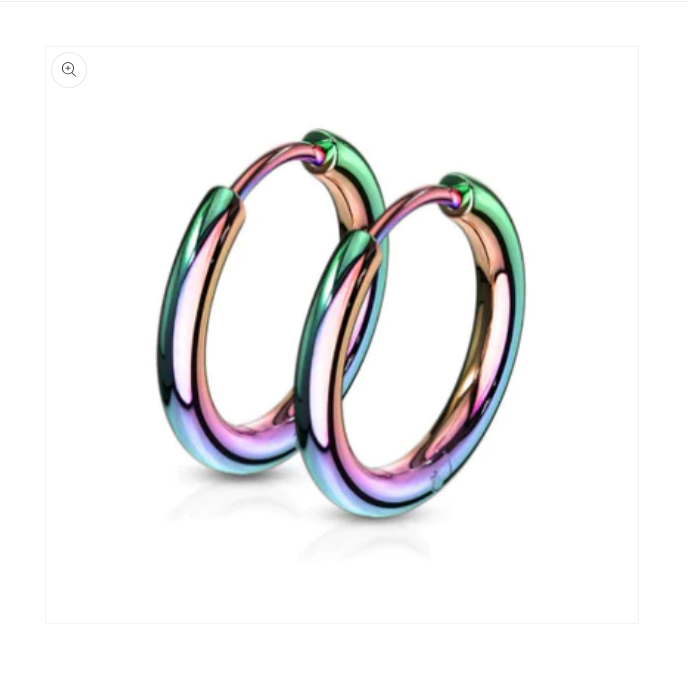 Rainbow hoop earrings made of anodised surgical steel, featuring vibrant rainbow colours and a stylish design.