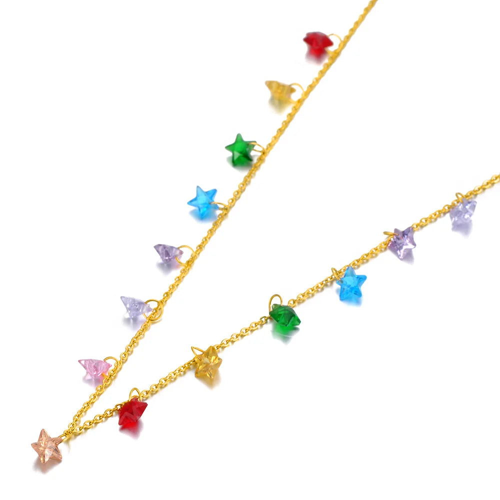 Star necklace featuring 14k gold plating and colorful CZ star charms in various hues, perfect for trendy outfits.