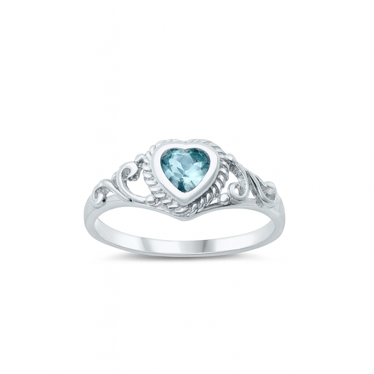 Silver ring with a heart-shaped blue gemstone on a white background