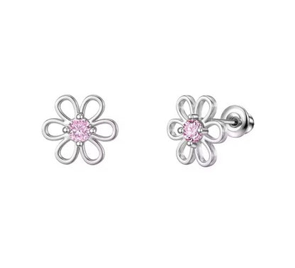 A pair of children's earrings made of surgical steel with a floral design and pink cubic zirconia in the center, attached with screw backs.