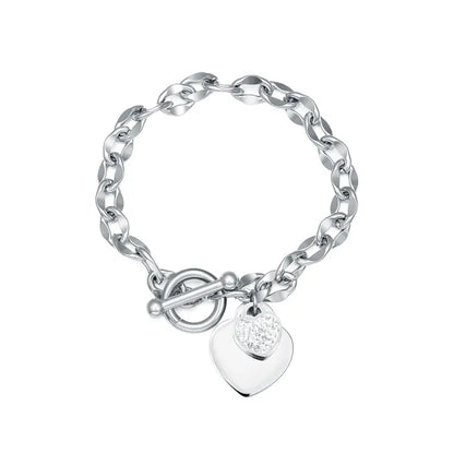 Titanium bracelet featuring chunky link design, toggle closure, and heart charms for elegant style.
