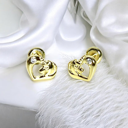Magical unicorn earrings featuring 14k gold over silver with heart designs and sparkly CZ accents, perfect for any outfit.