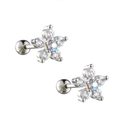 A pair of children's earrings featuring a clear CZ flower with an aurora borealis centre, with silver rods and screw backs.