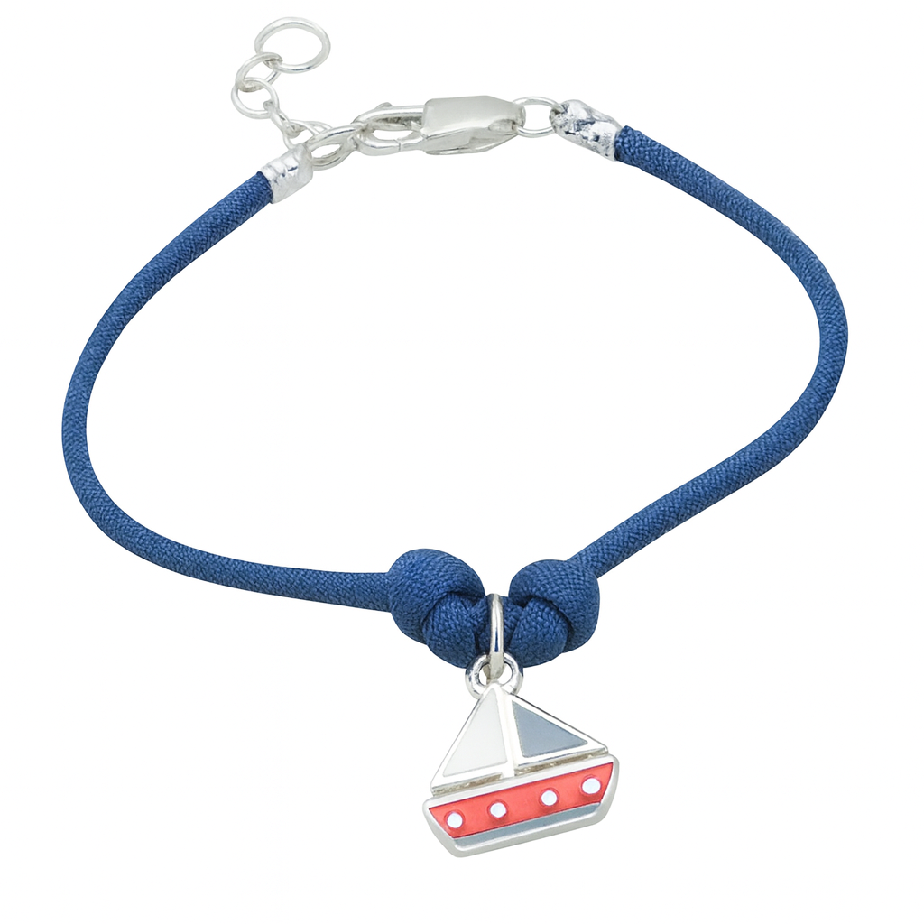 Blue cord bracelet with a sailboat charm on a white background