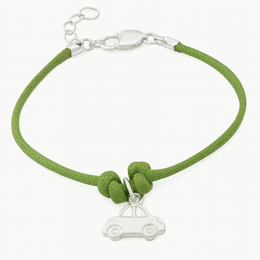 Boys' bracelet with green cord and sterling silver car charm, displayed on a plain white background.