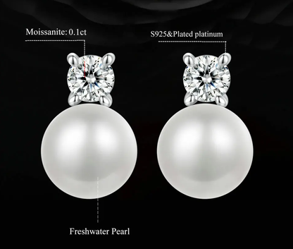 Flat lay of pearl earrings with screw-backs and premium silver setting – luxury gift style