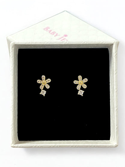 Flower-shaped gold plated cubic zirconia earrings in a white gift box with black velvet lining