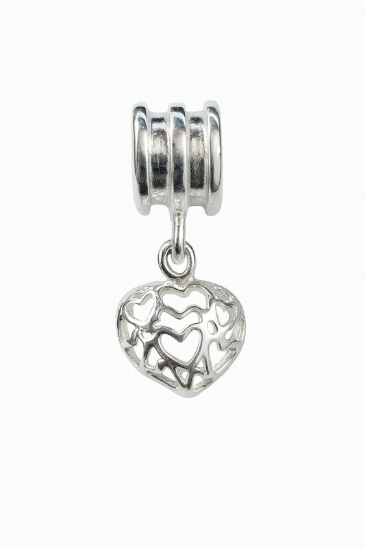 Close-up of a sterling silver charm on a white background: a ribbed cylindrical bail suspends an openwork heart pendant made of interlocking heart shapes, with polished surfaces and delicate detailing.