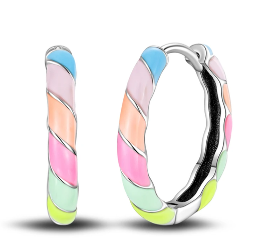 Hoop earrings with pastel-colored spiral design on a white background
