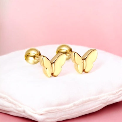 18K gold plated hypoallergenic butterfly earrings resting on cushion – Baby Jewels