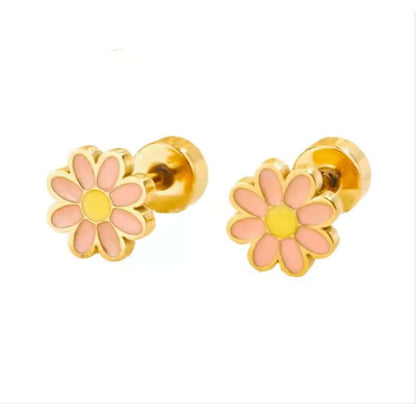 Two gold‑plated stainless‑steel barbell earrings shown side by side, each topped with a pink‑enamel daisy (eight rounded petals around a yellow centre) on a straight post and secured by a matching cylindrical screw‑on backing.