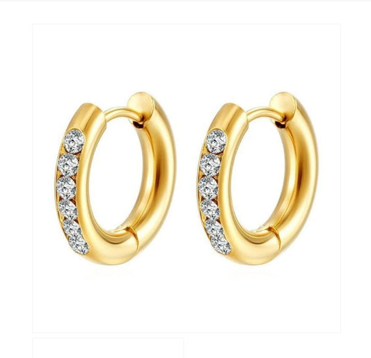 A pair of gold-coloured hoop earrings with clear cubic zirconia accents.
