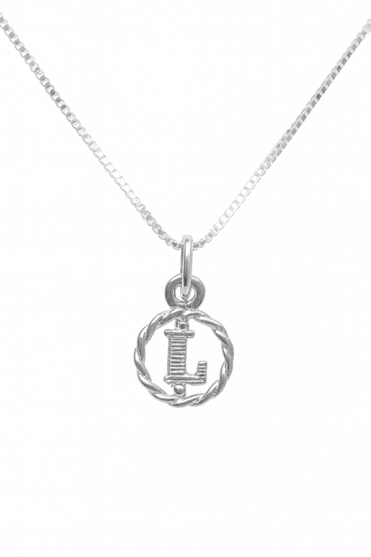 Silver necklace with a round pendant featuring the letter 'L' on a white background