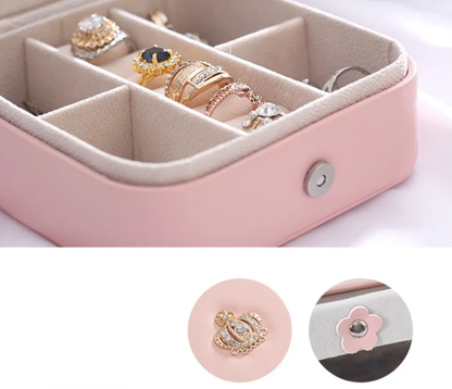 Interior of crown jewellery case with ring holder and divider sections