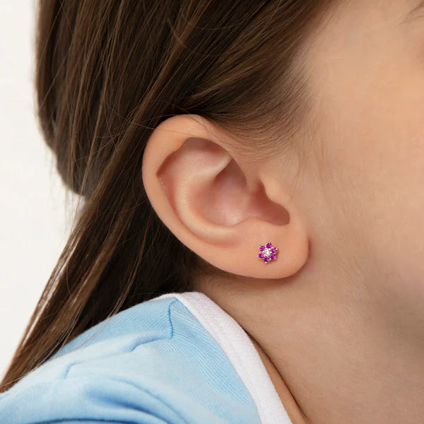 Multicolour CZ Flower Earrings in 925 sterling silver worn by a young girl, highlighting the sparkling design.