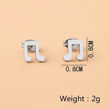Pair of stainless steel musical note stud earrings displayed on a soft, light lifestyle background with measurements