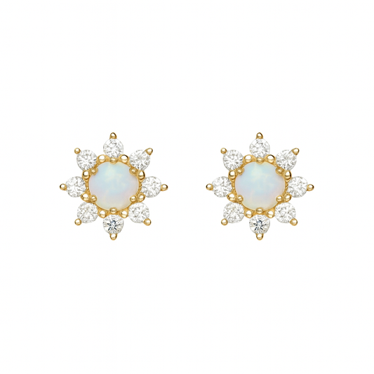Pair of yellow-gold flower stud earrings with round opal centres showing a subtle blue-green play of colour, surrounded by small clear cubic-zirconia petals, displayed on a white background
