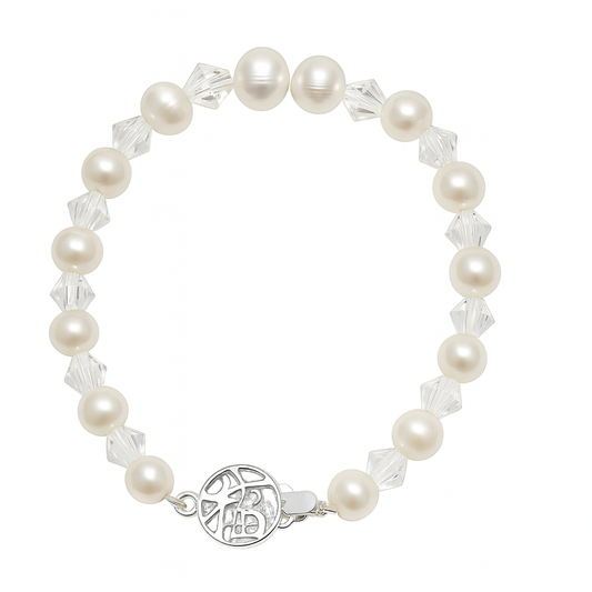 Pearl and crystal bracelet with a silver clasp on a white background