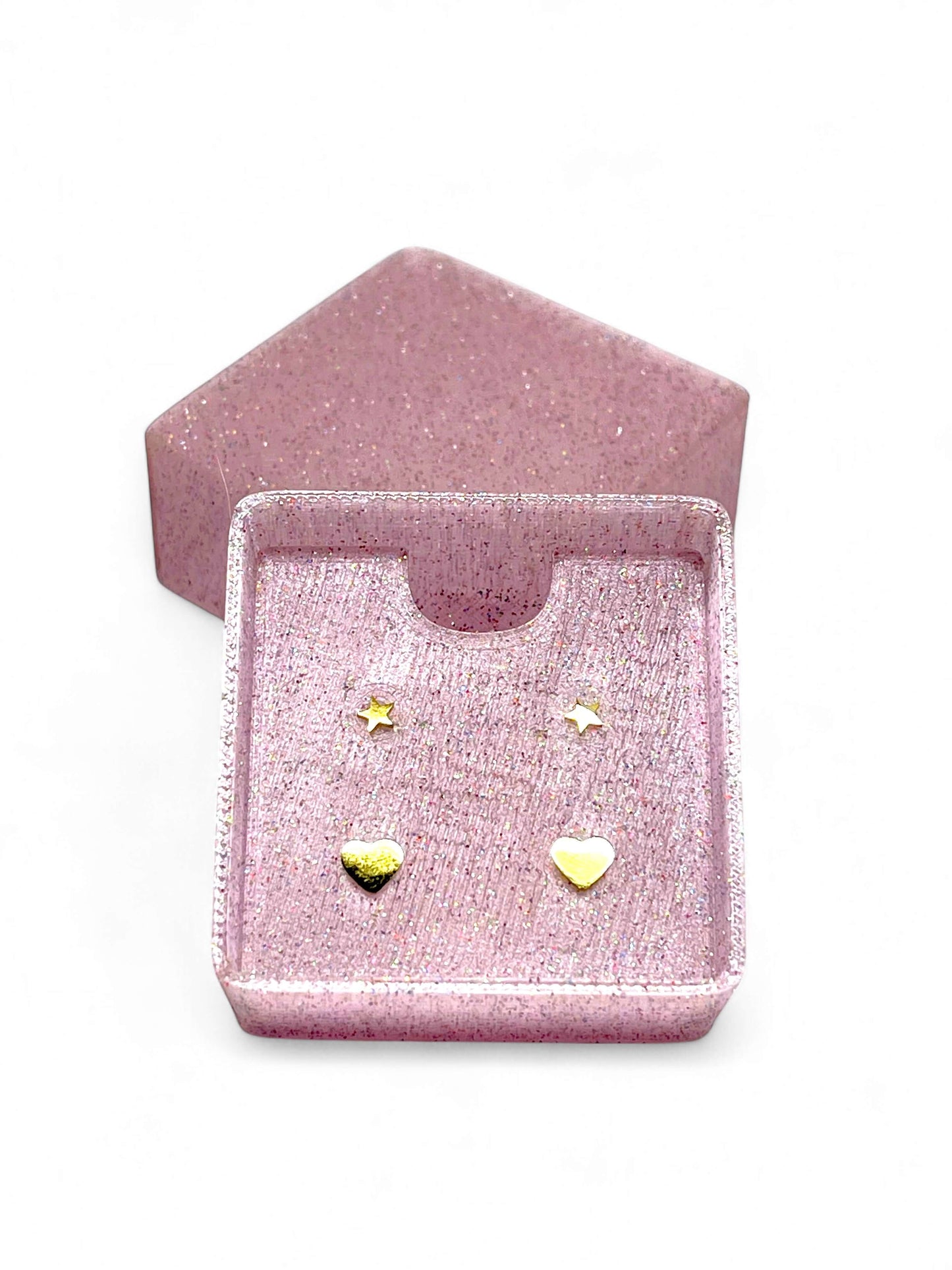 Children's earring set in a sparkly pink box featuring gold hearts and stars.
