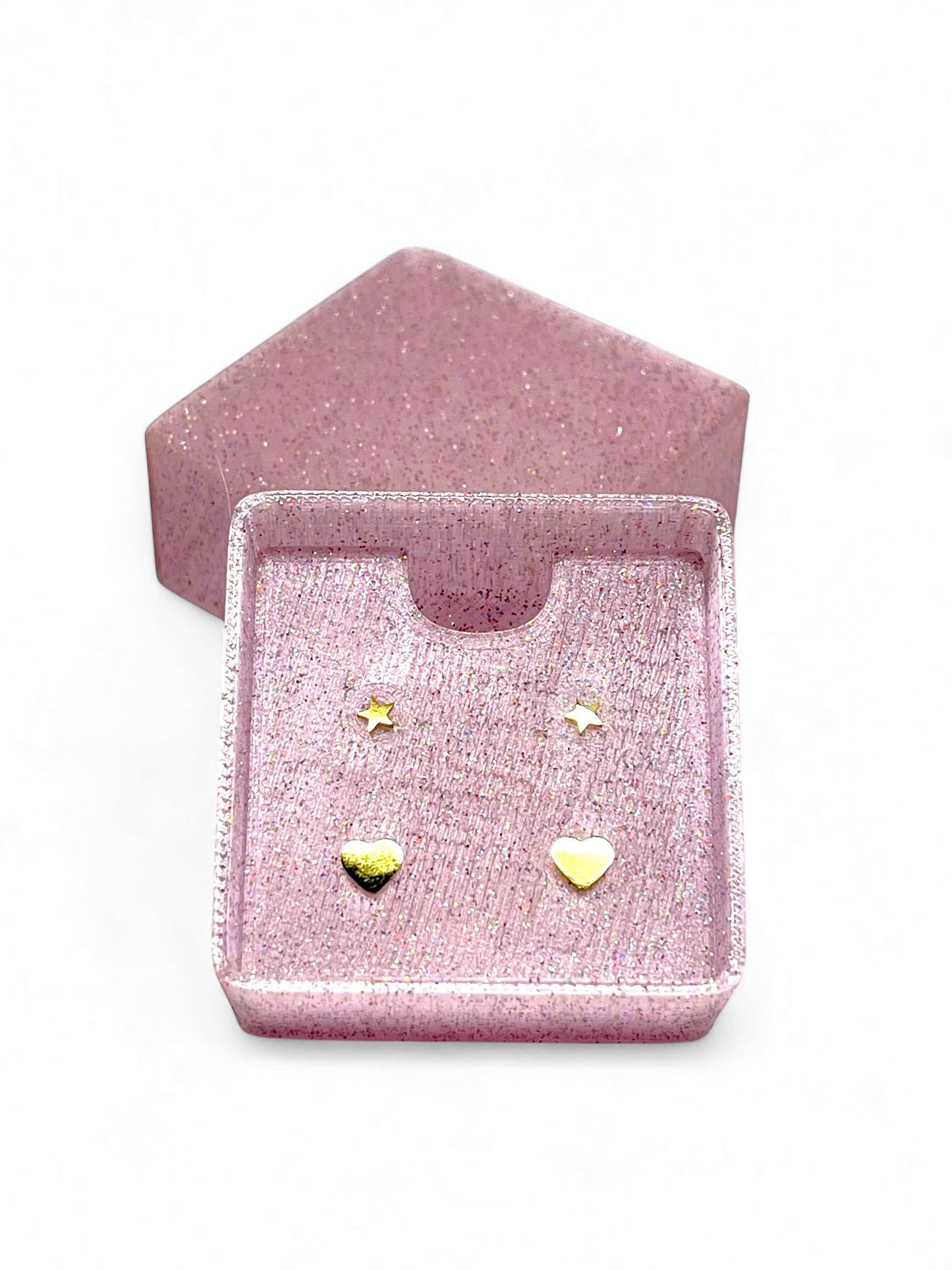 Children's earring set in a sparkly pink box featuring gold hearts and stars.