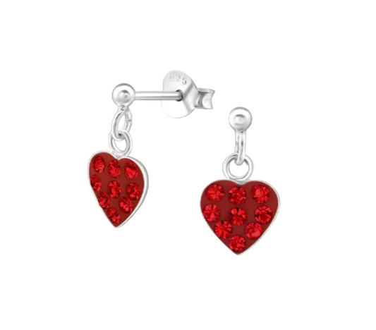 A pair of sterling silver drop heart earrings with red crystal embellishments, designed for children.