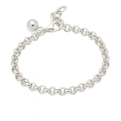 Silver chain bracelet with a round charm on a white background