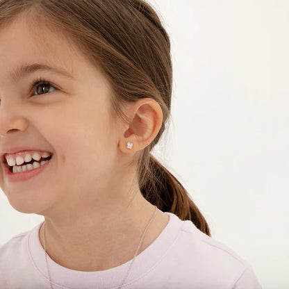 Young girl wearing butterfly earrings - hypoallergenic sterling silver for kids