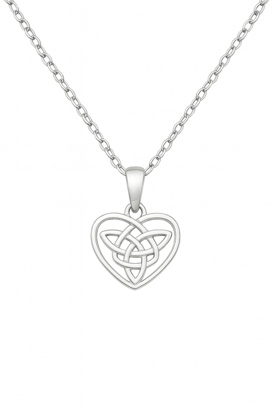 Sterling silver necklace on a white background, featuring a delicate oval-link chain and a heart-shaped pendant with an openwork Celtic knot design framed by a smooth polished heart outline.