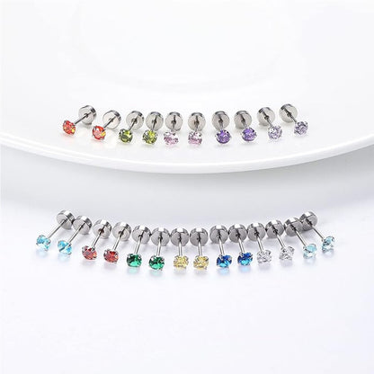 Set of silver earrings with colourful cubic zirconia on a white background