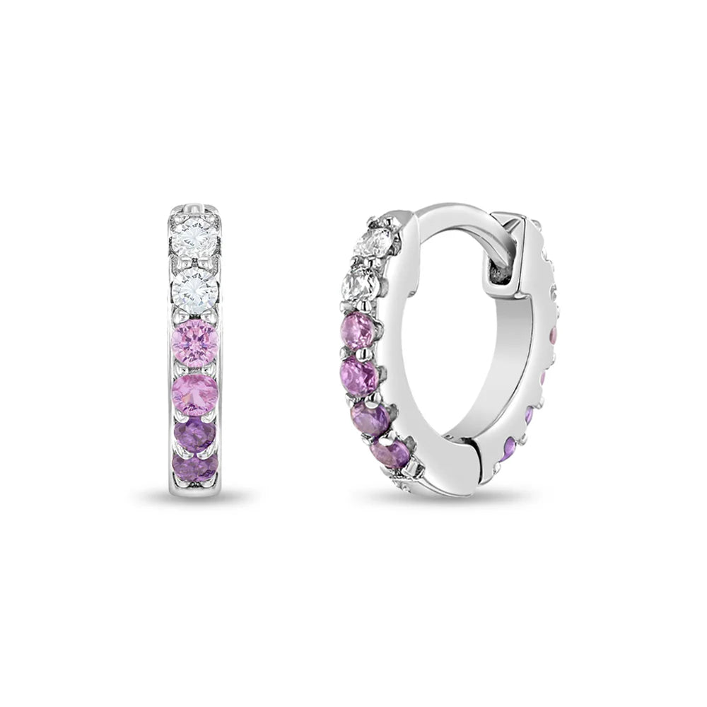 Children's earrings featuring sterling silver paved CZ huggie hoops with pink and purple stones.
