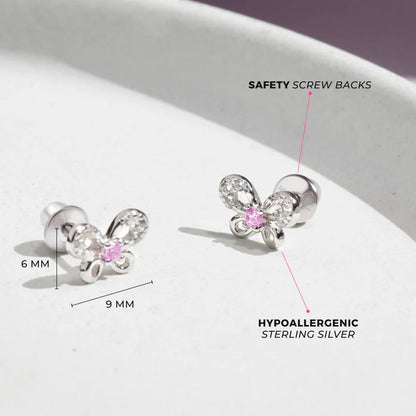 Close-up of butterfly stud earrings with cubic zirconia accents