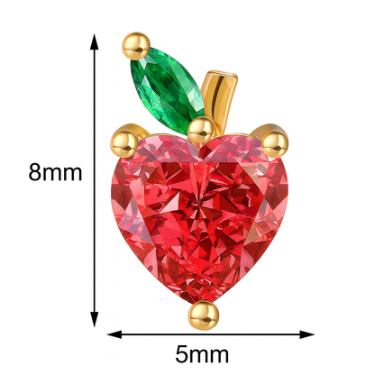 Red heart-shaped gemstone with green leaf and gold accents, shown with measurements.