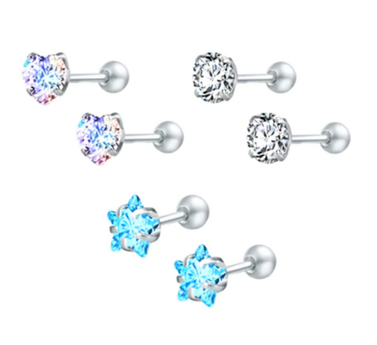 A set of children's earrings featuring various shapes and colours including aurora borealis hearts, blue stars, and clear round cz, all with screw back closures.