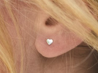 Tiny heart earrings - delicate 4mm polished hearts made from surgical steel for infants and toddlers.