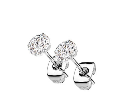 Pair of silver titanium earrings with clear cubic zirconia and push backs on a white background