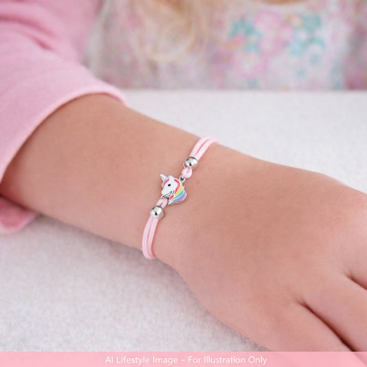 Children's bracelets featuring a sterling silver unicorn charm on a pink cotton cord, perfect for young children.