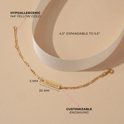 Figaro bracelet in 14k yellow gold with customizable engraving, expandable 4.5" to 5.5" for kids.